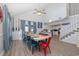 Open dining area with vaulted ceiling, stylish chairs and stairway to the second floor at 409 36Th Ave. N, North Myrtle Beach, SC 29582