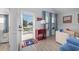 Bright living room with charming nautical decor, blue accents, and an inviting view from the open doorway at 409 36Th Ave. N, North Myrtle Beach, SC 29582