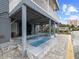 Beautiful outdoor dual level pool with stone surround and patio; perfect for entertaining with a view at 409 36Th Ave. N, North Myrtle Beach, SC 29582