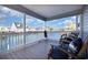 Serene porch with comfortable seating and a picturesque view of the canal at 409 36Th Ave. N, North Myrtle Beach, SC 29582