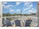 Relax on the rooftop deck featuring comfortable seating and panoramic views, perfect for enjoying the scenery at 409 36Th Ave. N, North Myrtle Beach, SC 29582