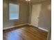 Comfortable bedroom with hardwood floors and a bright window at 412 Olive St., Georgetown, SC 29440