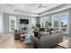 Inviting living room with plush seating, natural light, and coastal decor at 436 E Third St., Ocean Isle Beach, NC 28469