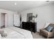 Cozy bedroom showcases a dresser, modern decor, and comforting natural light at 4517 East Coast Ln., Shallotte, NC 28470
