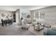 Inviting living room area with natural light, stylish furniture, and modern decor at 4517 East Coast Ln., Shallotte, NC 28470
