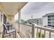 Private balcony with outdoor seating and views of the neighborhood and beach at 4601 N Ocean Blvd. # 201, North Myrtle Beach, SC 29582