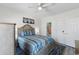Cozy bedroom showcases neutral tones, a comfortable bed, and ample closet space at 4787 Wild Iris Dr. # 203, Myrtle Beach, SC 29577
