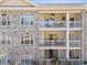 Condo building exterior with brick siding and multiple balconies at 4787 Wild Iris Dr. # 203, Myrtle Beach, SC 29577