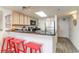 Eat-in kitchen with bar seating, stainless steel appliances, and plenty of counter space at 4800 S Ocean Blvd. # 304, North Myrtle Beach, SC 29582
