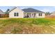 Expansive backyard with lush green grass and an extended patio area at 5026 Adrian Hwy., Conway, SC 29526
