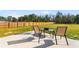 Spacious backyard featuring a patio with outdoor seating and a wooden fence at 5026 Adrian Hwy., Conway, SC 29526