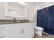 Bathroom featuring a white vanity with granite countertops, and a shower with a blue curtain at 5026 Adrian Hwy., Conway, SC 29526