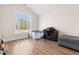 Bedroom featuring a large window, desk, and wood-look flooring at 5026 Adrian Hwy., Conway, SC 29526