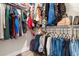 Organized walk-in closet featuring ample storage space, hanging rods, and shelving for clothing at 5026 Adrian Hwy., Conway, SC 29526