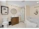 Bathroom with shower, toilet, jacuzzi tub and decorative accessories at 513 Hillside Dr. S, North Myrtle Beach, SC 29582