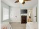 Bedroom features two beds, a flatscreen TV and an open door at 513 Hillside Dr. S, North Myrtle Beach, SC 29582