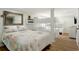 Bedroom with bright bunk beds, a queen bed and wooden floors at 513 Hillside Dr. S, North Myrtle Beach, SC 29582