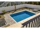 An aerial view of a private swimming pool surrounded by lush landscaping at 513 Hillside Dr. S, North Myrtle Beach, SC 29582