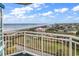 Breathtaking ocean view from the balcony, overlooking the beach, beautiful blue sky, and surrounding coastal neighborhood at 5200 Ocean Blvd. N # 855, Myrtle Beach, SC 29577