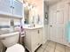 Charming bathroom features a toilet, sink, vanity with cabinets and a mirror at 5523 North Ocean Blvd. # 2112, Myrtle Beach, SC 29577