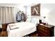 Cozy bedroom with a comfortable bed, a dresser, and a closet rod for hanging clothes at 5523 North Ocean Blvd. # 2112, Myrtle Beach, SC 29577