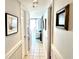 Bright hallway leading to condo living area with views of the oceanfront balcony at 5523 North Ocean Blvd. # 2112, Myrtle Beach, SC 29577