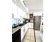 Efficient kitchen features stainless appliances, updated cabinets, and sleek countertops at 5523 North Ocean Blvd. # 2112, Myrtle Beach, SC 29577