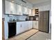 Efficient kitchen features stainless appliances, updated cabinets, and sleek countertops at 5523 North Ocean Blvd. # 2112, Myrtle Beach, SC 29577