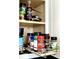 Organized spices are neatly arranged on a pull-out spice rack in a kitchen cabinet at 5523 North Ocean Blvd. # 2112, Myrtle Beach, SC 29577