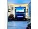 Cozy living room featuring a modern fireplace, a flat-screen TV, and tasteful nautical decor, blending comfort with coastal charm at 5523 North Ocean Blvd. # 2112, Myrtle Beach, SC 29577