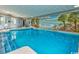 Enjoy a refreshing swim in this well-lit indoor pool with tropical mural at 5523 North Ocean Blvd. # 2112, Myrtle Beach, SC 29577