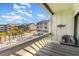 Balcony offers a pleasant view of the neighborhood, complemented by the inviting community pool at 627 North Waccamaw Dr. # 212, Murrells Inlet, SC 29576