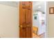 An open door reveals a glimpse into a kitchen space at 627 North Waccamaw Dr. # 212, Murrells Inlet, SC 29576