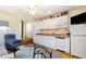 Cozy living space with a modern kitchen, comfortable seating, and a bright atmosphere at 627 North Waccamaw Dr. # 212, Murrells Inlet, SC 29576