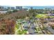 A high angle aerial view of the community that highlights the landscape and beach view at 633 White Oak Ln., North Myrtle Beach, SC 29582