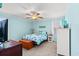 Charming bedroom features a coastal-themed decor, ceiling fan, and natural light at 633 White Oak Ln., North Myrtle Beach, SC 29582