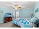Bedroom featuring coastal themed decor, ceiling fan, and TV at 633 White Oak Ln., North Myrtle Beach, SC 29582