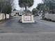 A street view showing the Ocean Oaks Plantation community entrance with well manicured vegetation at 633 White Oak Ln., North Myrtle Beach, SC 29582