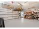 Spacious garage with epoxy flooring, storage racks, workbench, and ample room for parking at 633 White Oak Ln., North Myrtle Beach, SC 29582