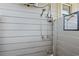 Outdoor shower features shower head and mirror at 633 White Oak Ln., North Myrtle Beach, SC 29582