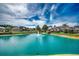 Picturesque pond with a fountain, enhancing the serene atmosphere of the surrounding homes at 639 Tarrant St., Longs, SC 29568