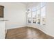 Sun-filled dining room with hardwood floors and bay window at 654 Evers Loop, Surfside Beach, SC 29575
