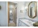 Bathroom featuring a sink, a mirror, and the entrance to another room beyond at 762 Wraggs Ferry Rd., Georgetown, SC 29440