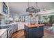 Bright kitchen with white cabinets, wood island, stainless appliances and adjacent dining nook at 762 Wraggs Ferry Rd., Georgetown, SC 29440