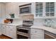 Modern kitchen showcases stainless steel oven, white cabinets, and quartz countertops at 762 Wraggs Ferry Rd., Georgetown, SC 29440