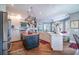 Spacious kitchen boasts white cabinets, a butcher block island, and stainless steel appliances at 762 Wraggs Ferry Rd., Georgetown, SC 29440