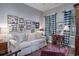 Living room features a sofa, side tables, and many framed photos on the wall at 762 Wraggs Ferry Rd., Georgetown, SC 29440