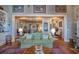 Spacious living room with hardwood floors and views into the dining room and foyer at 762 Wraggs Ferry Rd., Georgetown, SC 29440