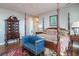 Elegant main bedroom with four poster bed, bench, and decorative antique furniture at 762 Wraggs Ferry Rd., Georgetown, SC 29440