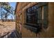 A rustic shed offers additional storage space and complements the outdoor landscape at 762 Wraggs Ferry Rd., Georgetown, SC 29440